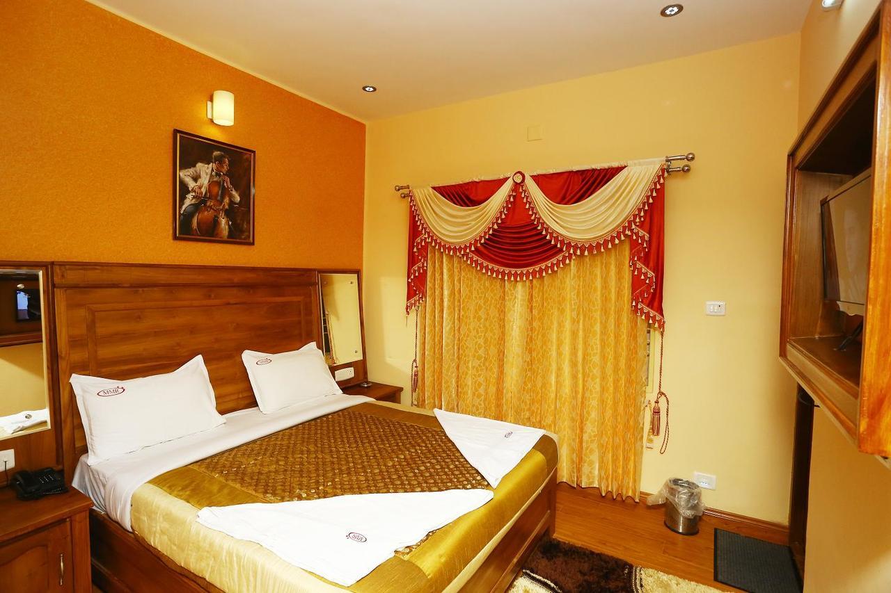 Mmr Grand Inn Уті Екстер'єр фото